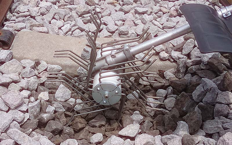 パワースパイダー （電動式砕石整理器具）